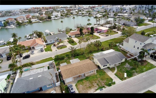 bird's eye view with a water view and a residential view