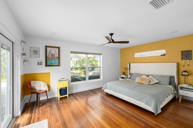 bedroom featuring hardwood / wood-style flooring and ceiling fan