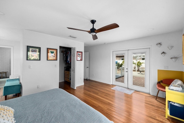 bedroom with french doors, ceiling fan, access to exterior, and hardwood / wood-style floors