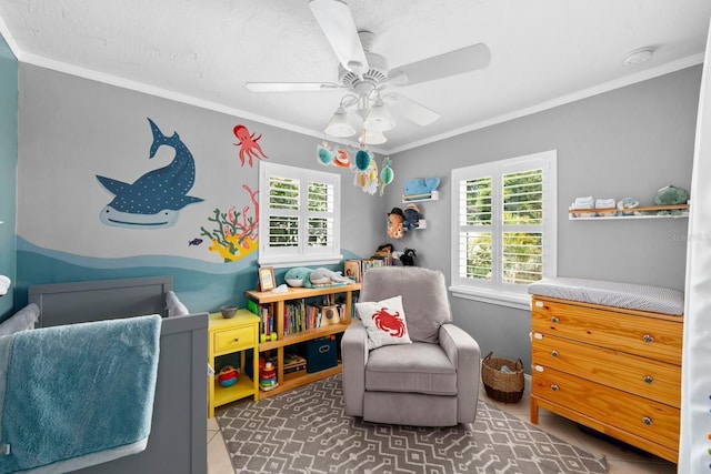 tiled bedroom featuring crown molding and ceiling fan