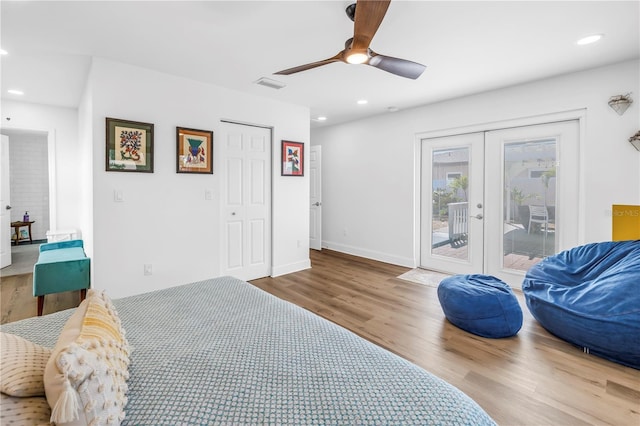 bedroom featuring visible vents, recessed lighting, wood finished floors, french doors, and access to exterior