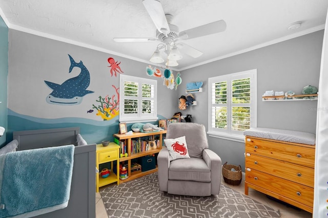 tiled bedroom featuring multiple windows, crown molding, and a ceiling fan