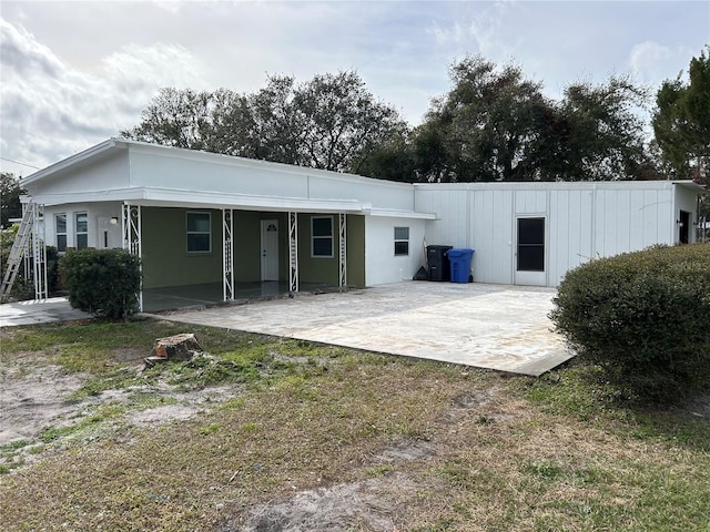 back of house featuring a patio