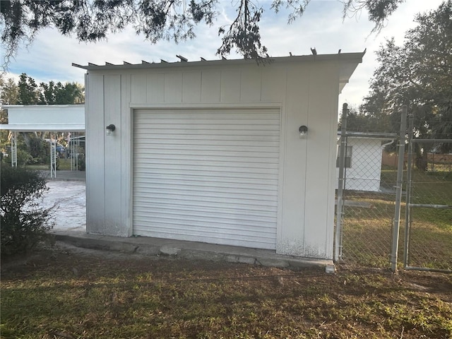 garage featuring a carport