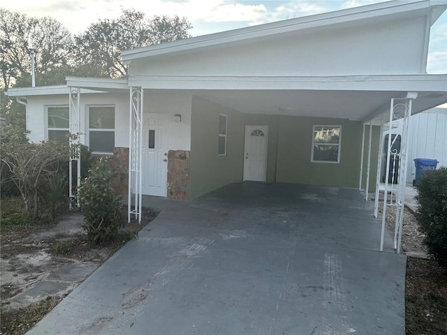 view of front of house with a carport