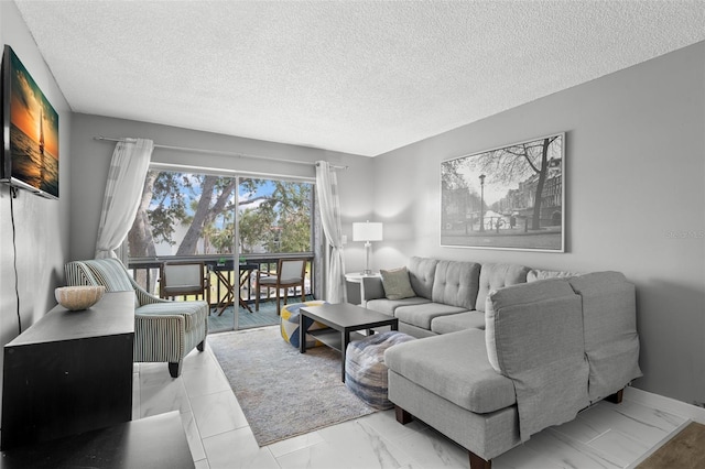 living room with a textured ceiling