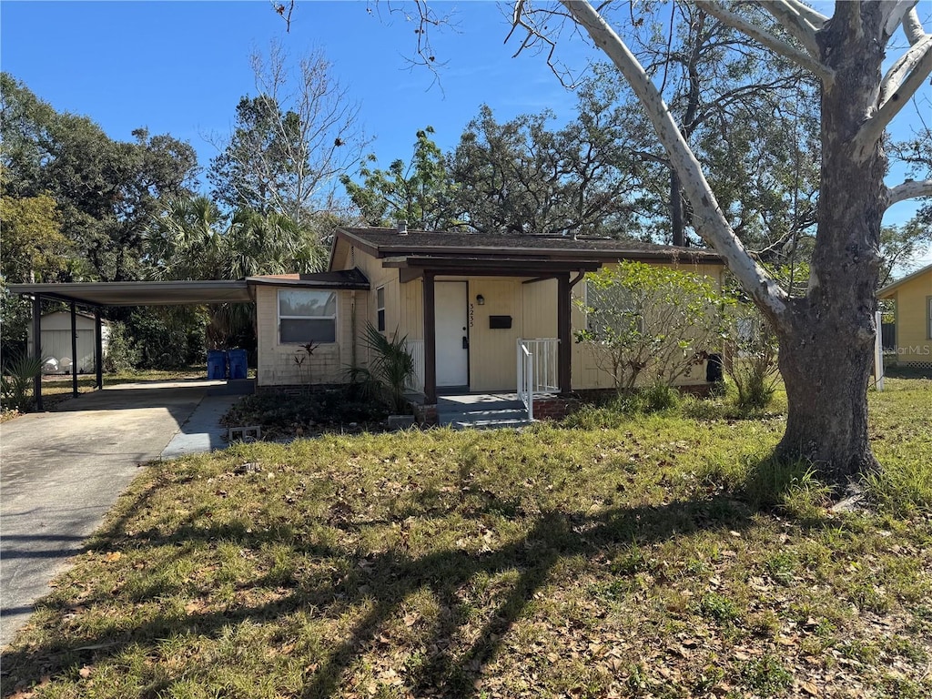 view of front of house featuring a carport