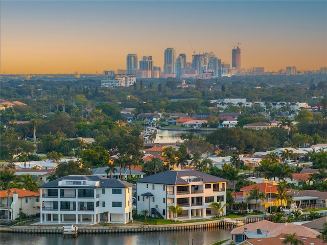 aerial view at dusk with a water view