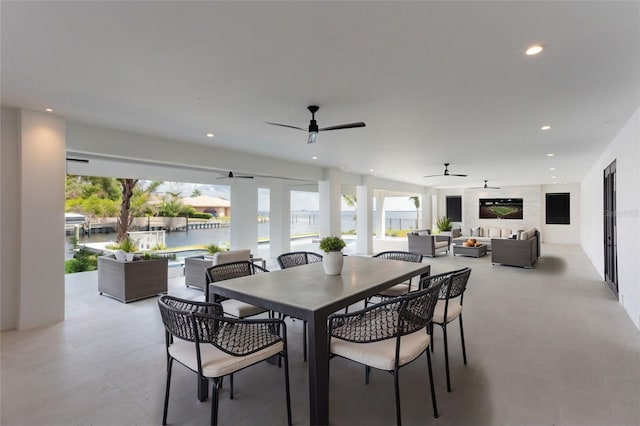 dining room featuring ceiling fan