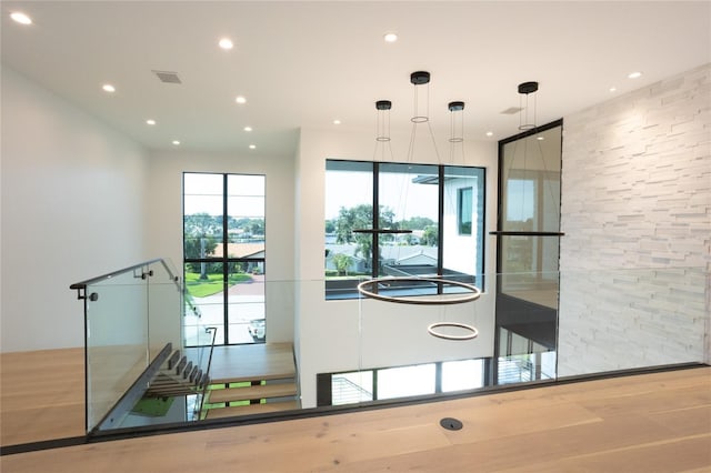 entryway with wood-type flooring