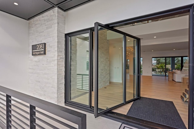 doorway to property with a balcony