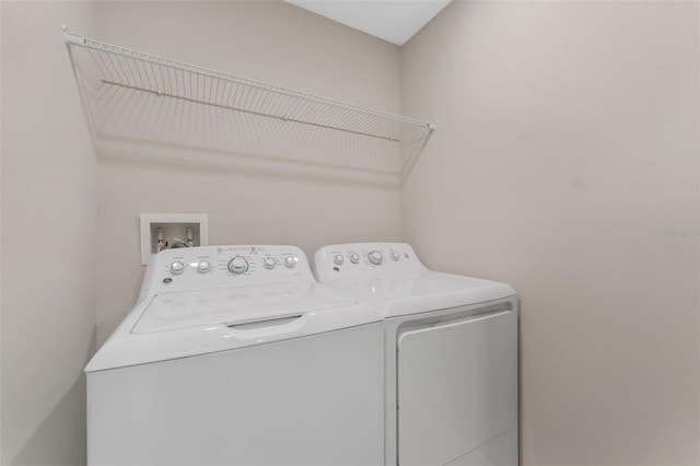 washroom featuring separate washer and dryer