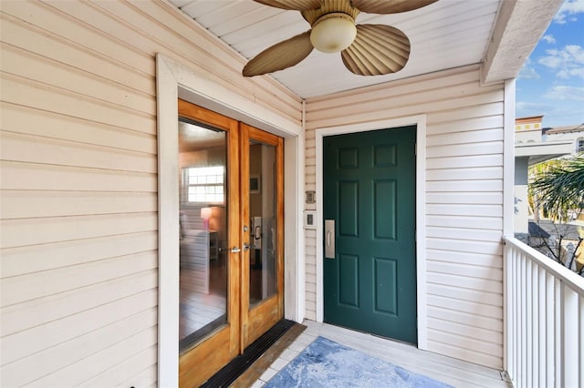 doorway to property with ceiling fan and french doors