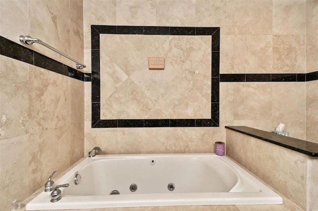 bathroom featuring tiled tub