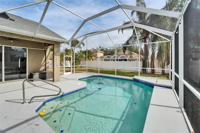 view of pool featuring a lanai and a patio area