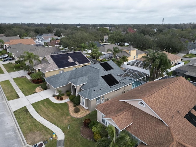 birds eye view of property with a residential view