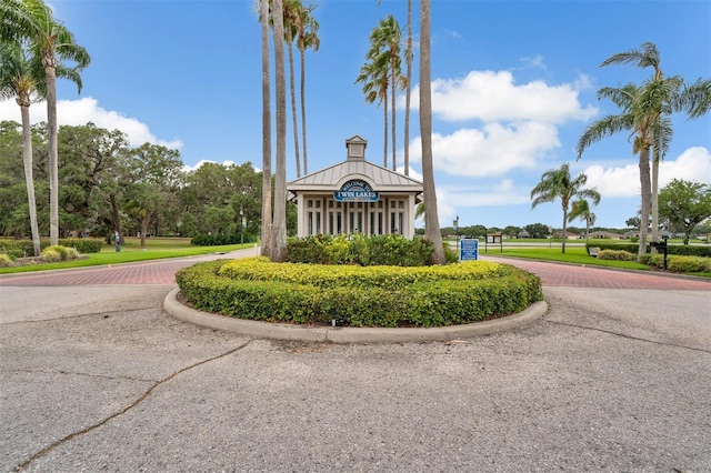 view of home's community featuring decorative driveway