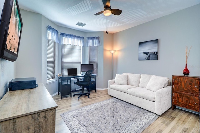 office area featuring ceiling fan and light hardwood / wood-style flooring