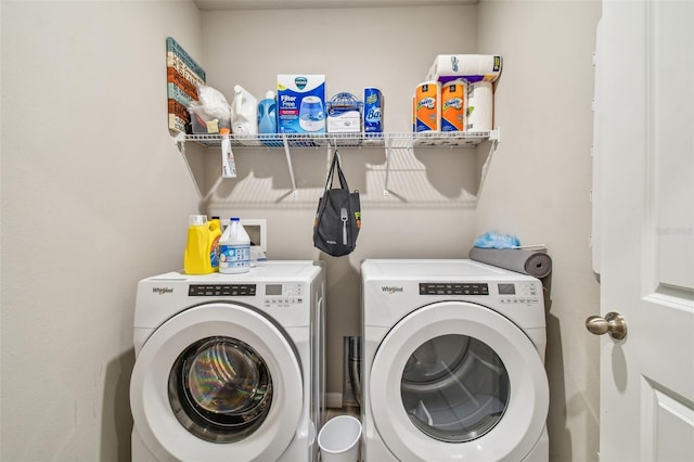 laundry area featuring independent washer and dryer