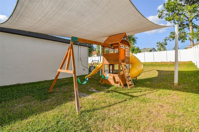 view of playground featuring a lawn