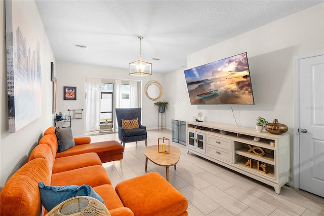 living room featuring a textured ceiling