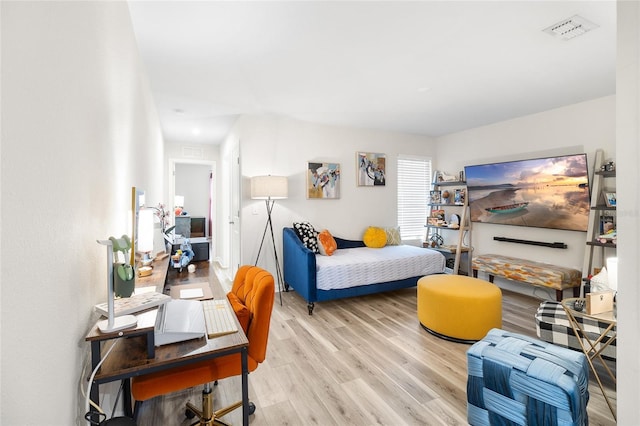 bedroom featuring light hardwood / wood-style floors