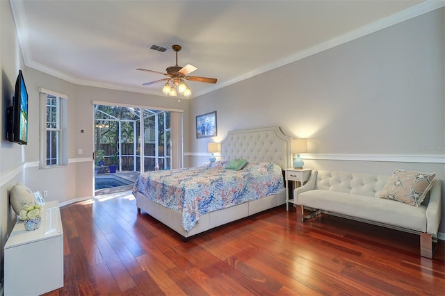 bedroom featuring dark hardwood / wood-style floors, ceiling fan, ornamental molding, and access to exterior