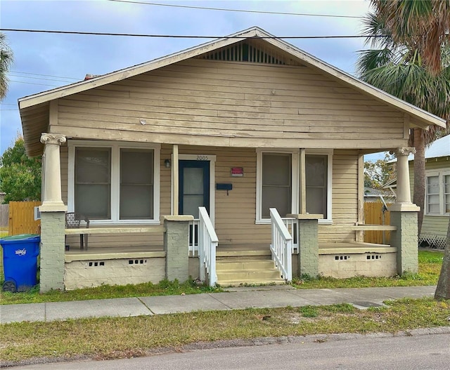 bungalow-style home featuring covered porch