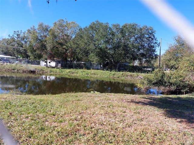 view of yard with a water view