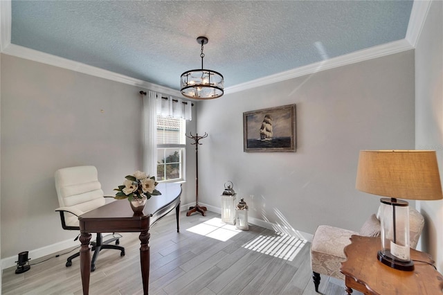 office featuring ornamental molding, a chandelier, a textured ceiling, and light hardwood / wood-style flooring