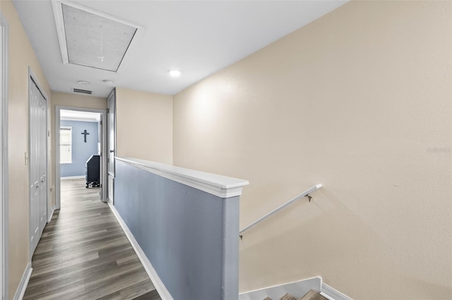 corridor featuring dark wood-type flooring