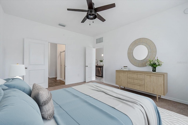 bedroom featuring ceiling fan and light carpet