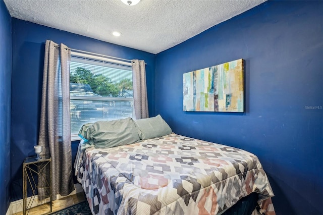 bedroom with a textured ceiling