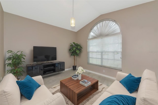 living room with vaulted ceiling