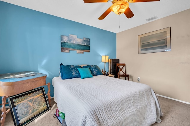 carpeted bedroom featuring ceiling fan