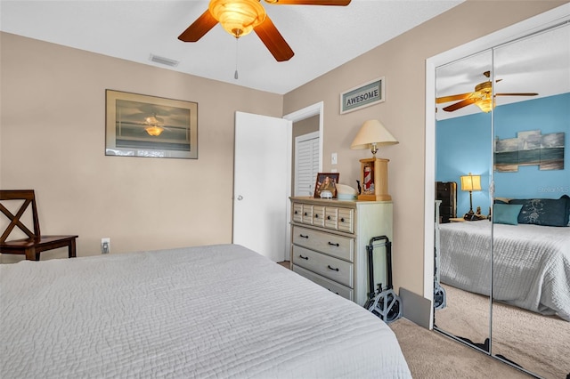 bedroom with light carpet and ceiling fan