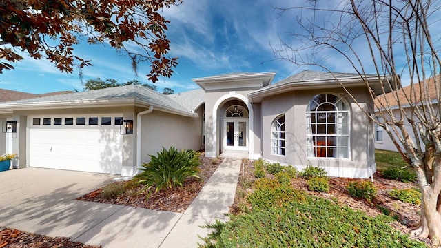 view of front of property featuring a garage