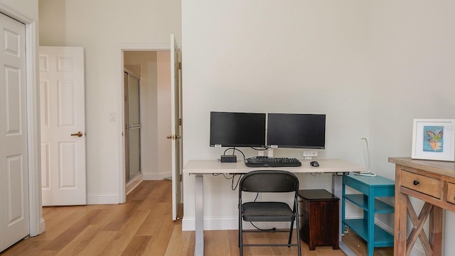 home office featuring light hardwood / wood-style floors