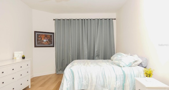 bedroom featuring light hardwood / wood-style floors