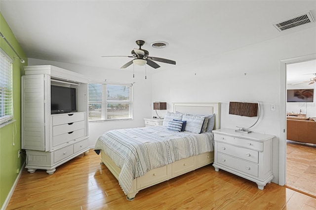 1309 Nokomis Ave S, Venice, FL 34285 - bedroom featuring light wood-style flooring and ceiling fan