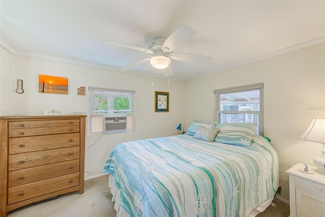 carpeted bedroom with ornamental molding, cooling unit, and ceiling fan