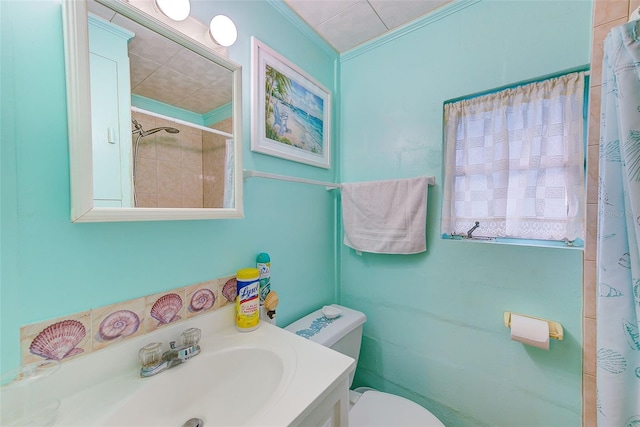 bathroom featuring vanity, curtained shower, crown molding, and toilet