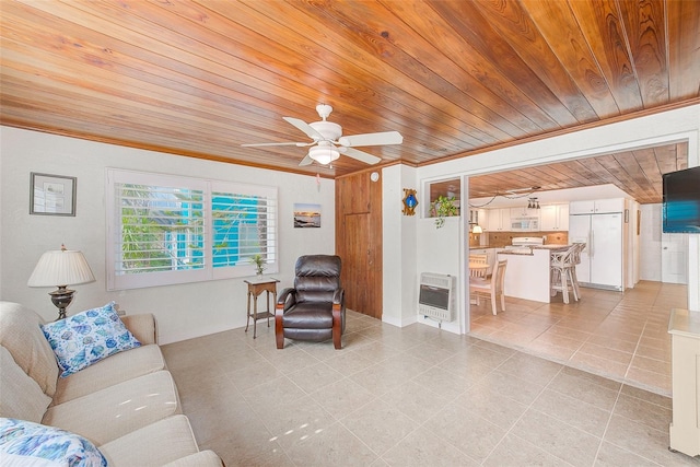 living room with light tile patterned floors, wood ceiling, crown molding, ceiling fan, and heating unit