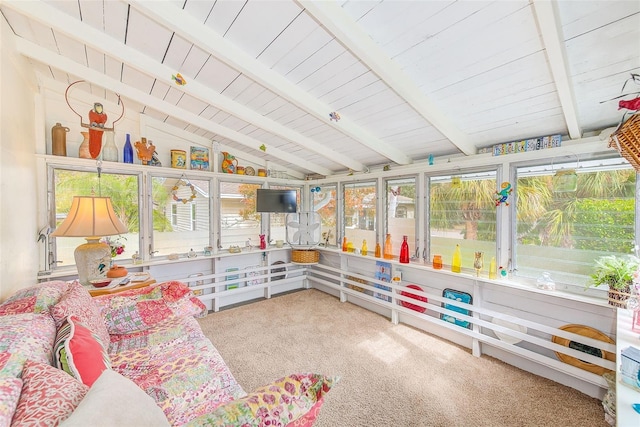 sunroom / solarium with wood ceiling and vaulted ceiling with beams