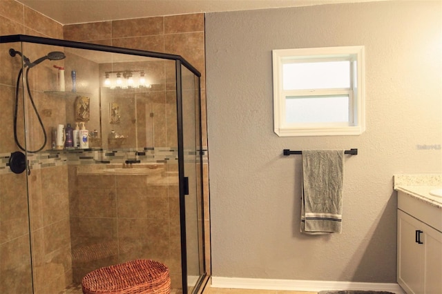 bathroom featuring vanity and walk in shower