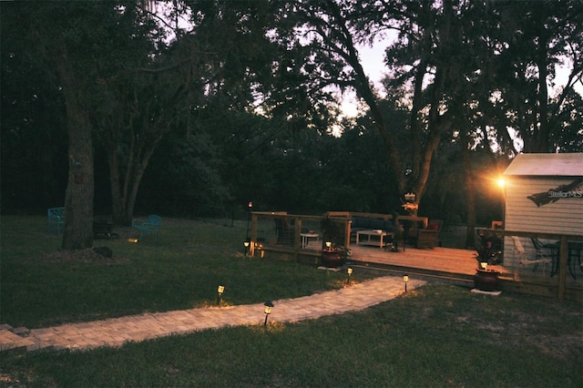 view of yard featuring a wooden deck