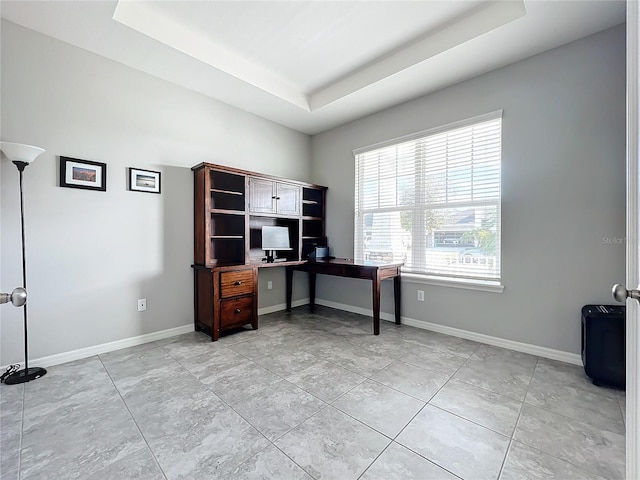 office featuring a raised ceiling