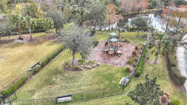 birds eye view of property with a water view