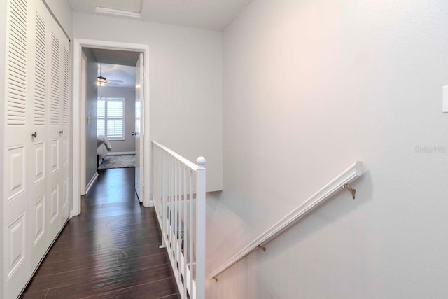 hall with dark hardwood / wood-style floors