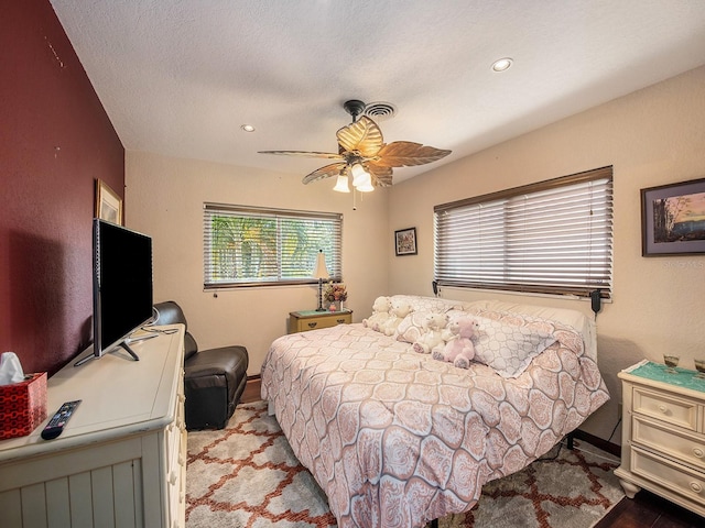 1818 Dolphin Blvd S, Saint Petersburg, FL 33707 - bedroom featuring ceiling fan and a textured ceiling